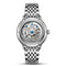 Silver watch with visible mechanical components on a white background