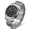 Silver wristwatch with black dial on a white background
