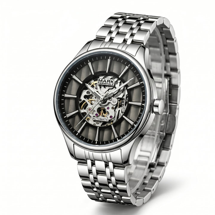 Silver wristwatch with a detailed mechanical face on a white background