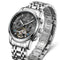 Silver wristwatch with detailed face on a white background