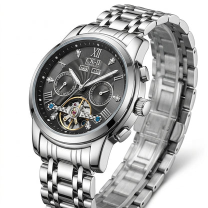 Silver wristwatch with detailed face on a white background