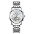 Silver wristwatch with detailed face on a white background
