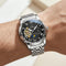 Silver wristwatch with a black face on a wrist, brand 'Fairwhale' visible
