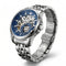 Silver wristwatch with a blue face on a white background