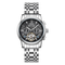 Silver wristwatch with a detailed face on a white background