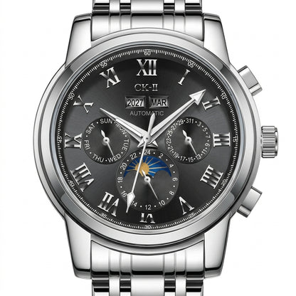 Silver wristwatch with a detailed black face on a white background