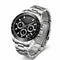 Silver wristwatch with black dial on a white background
