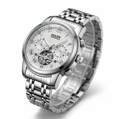 Silver wristwatch with detailed face on a white background