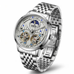 Silver wristwatch with intricate design on a white background