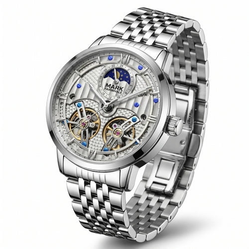 Silver wristwatch with intricate design on a white background