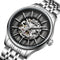 Silver wristwatch with visible mechanical components on a white background
