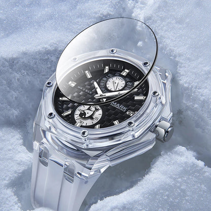 Sporty Men’s Quartz Watch with clear case and carbon dial standing upright in snow, highlighting durability and water resistance.