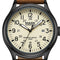 Watch with a beige dial and brown leather strap on a white background