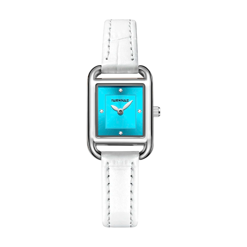 Watch with a white strap and turquoise face on a white background