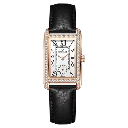 Watch with black leather strap and rose gold case on a white background