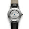 Watch with black leather strap and visible mechanical components on a white background