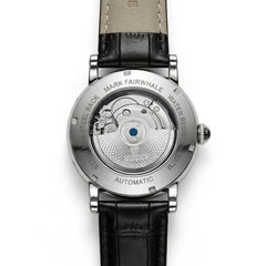 Watch with black leather strap and visible mechanical components on a white background