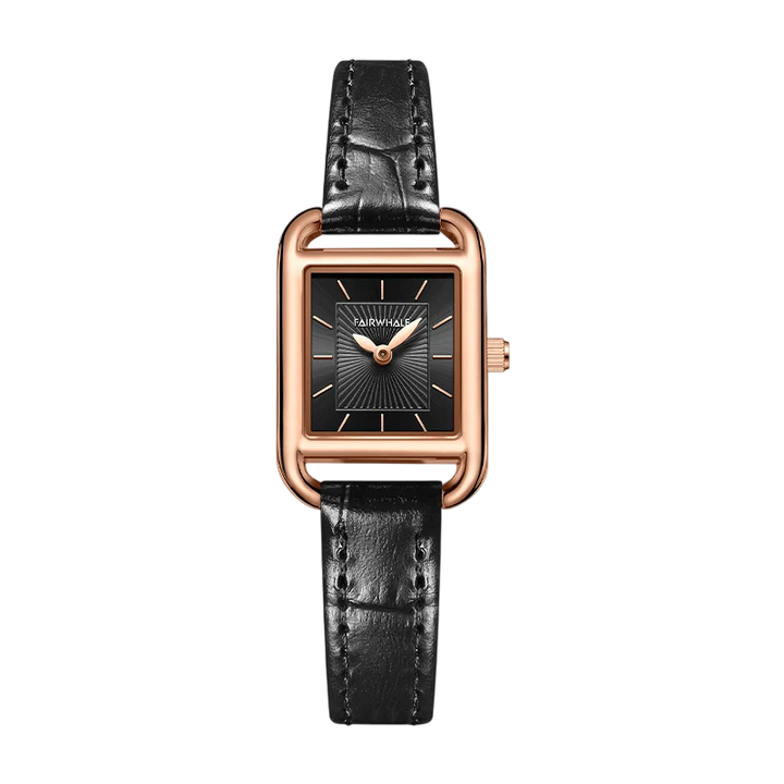 Watch with black leather strap and rose gold case on a white background