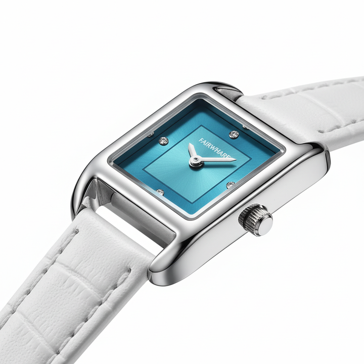 Watch with blue face and white strap on a white background