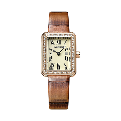 Watch with brown leather strap and gold case on a white background
