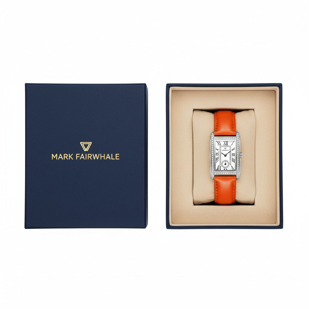 Watch with orange strap in a Mark Fairwhale box on a white background
