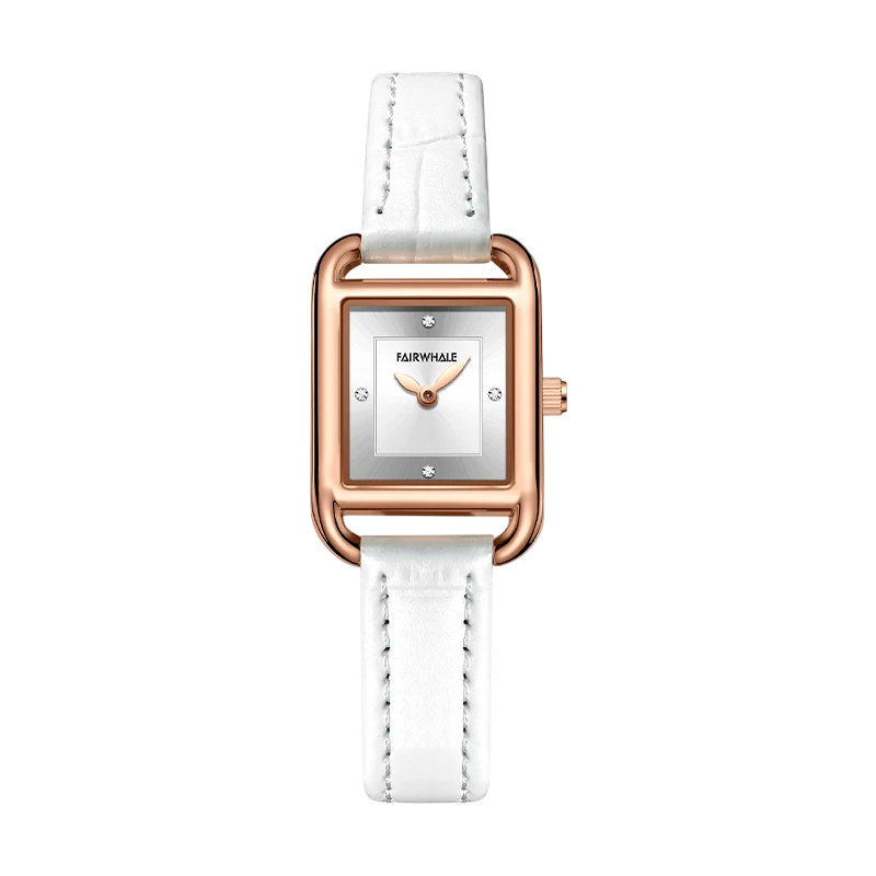 Watch with white strap and rose gold case on a white background