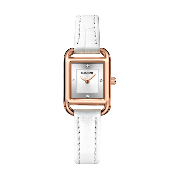 Watch with white strap and rose gold case on a white background