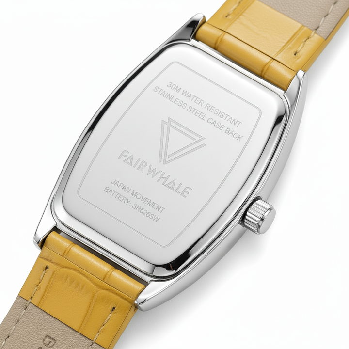 Watch with yellow strap and silver case on a white background