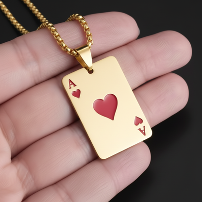 Mark Fairwhale gold Ace of Hearts card pendant necklace held in hand