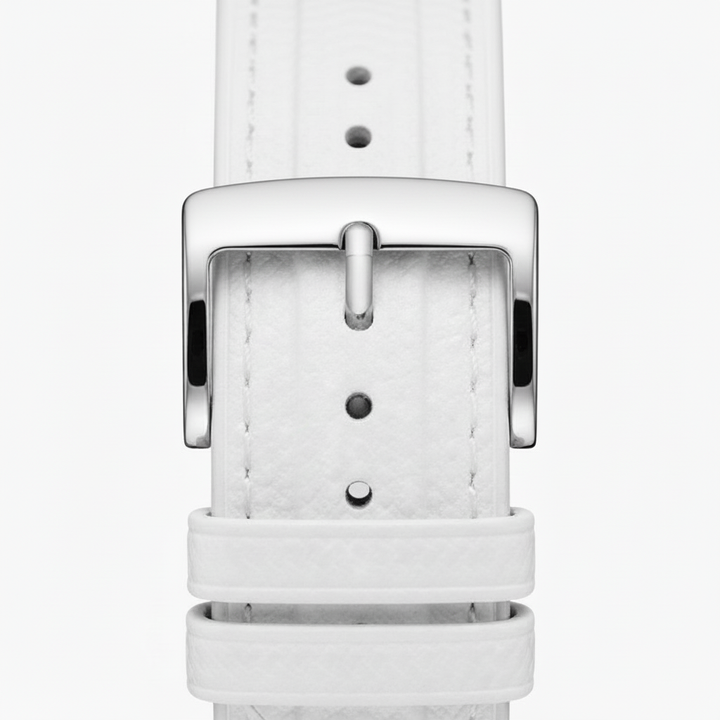 White leather watch strap with silver buckle on a white background