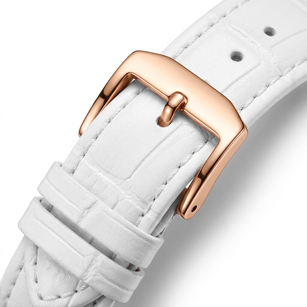 White leather watch strap with a rose gold buckle on a white background