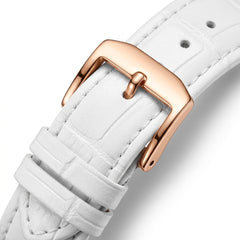 White leather watch strap with a rose gold buckle on a white background