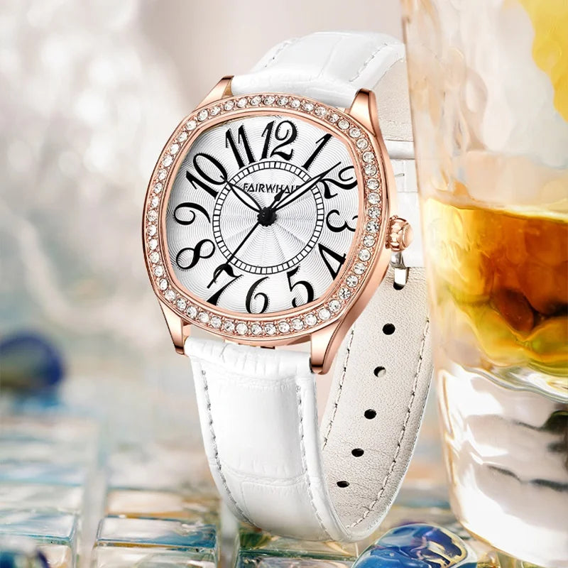 Woman wearing Mark Fairwhale ORIKEI luxury retro quartz watch with crystal accents and white strap
