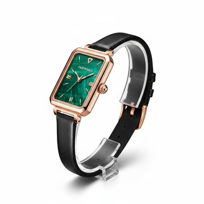 Wristwatch with green face and black strap on a white background