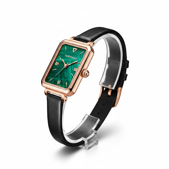 Wristwatch with green face and black strap on a white background