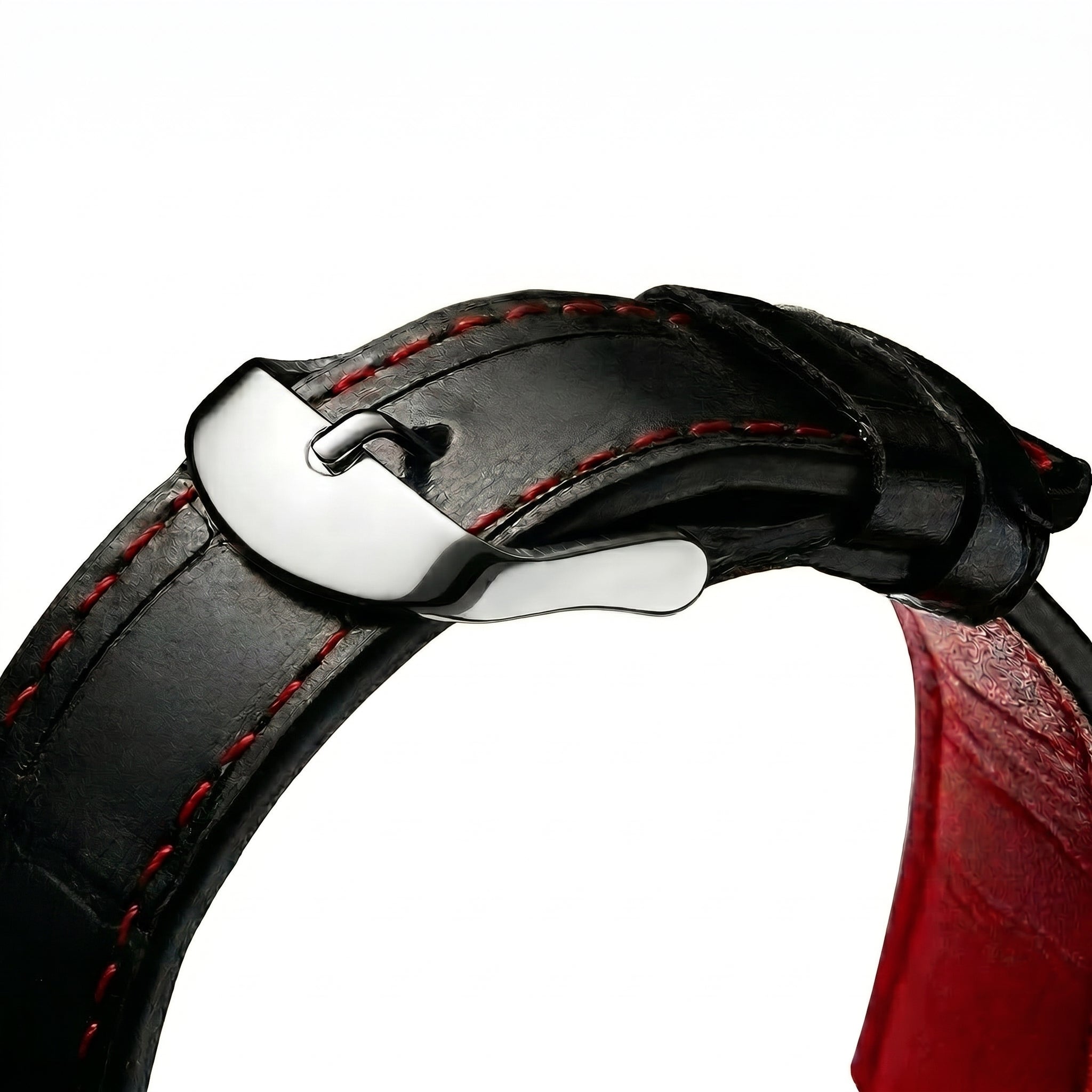 Close-up of a black leather watch strap with red stitching and a silver buckle on a white background.