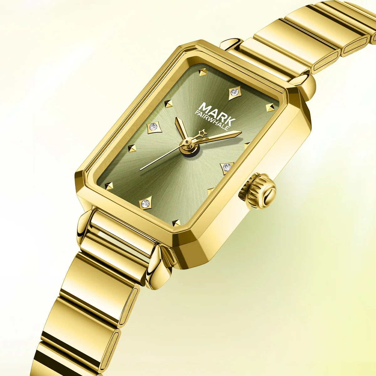 Close-up of Mark Fairwhale FW-3070 ALERIA Square Quartz Women’s Watch with green dial and gold bracelet, luxury detail shot.