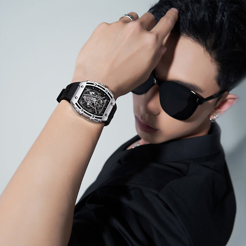 Mark Fairwhale BARRELIUS barrel-shaped stainless steel automatic watch side view with crown.