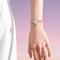 Mark Fairwhale FW-3860 LUXORA women’s quartz watch worn on wrist with clover dial and rose gold bracelet
