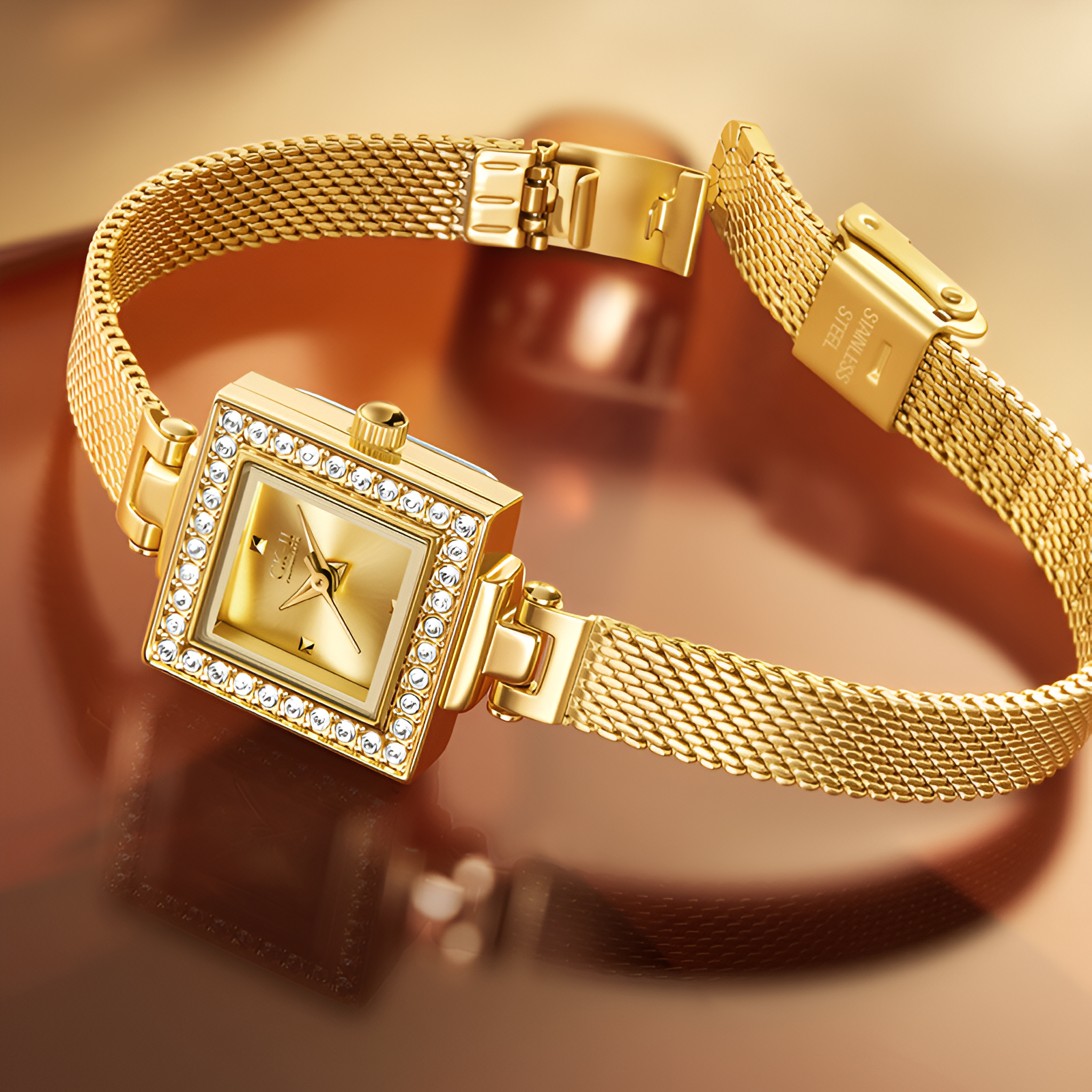 Gold Milanese steel strap and square case detail of Mark Fairwhale FW-3870 Celesta women’s watch