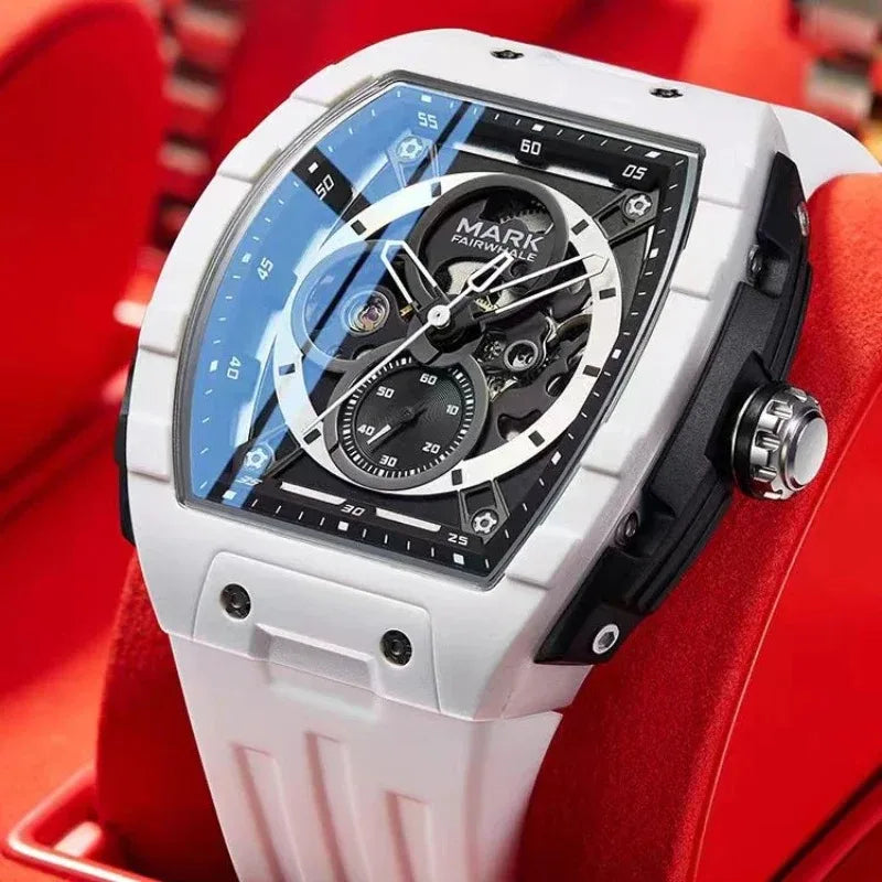 Mark Fairwhale NEXURIS skeleton watch with white strap showcased on red background