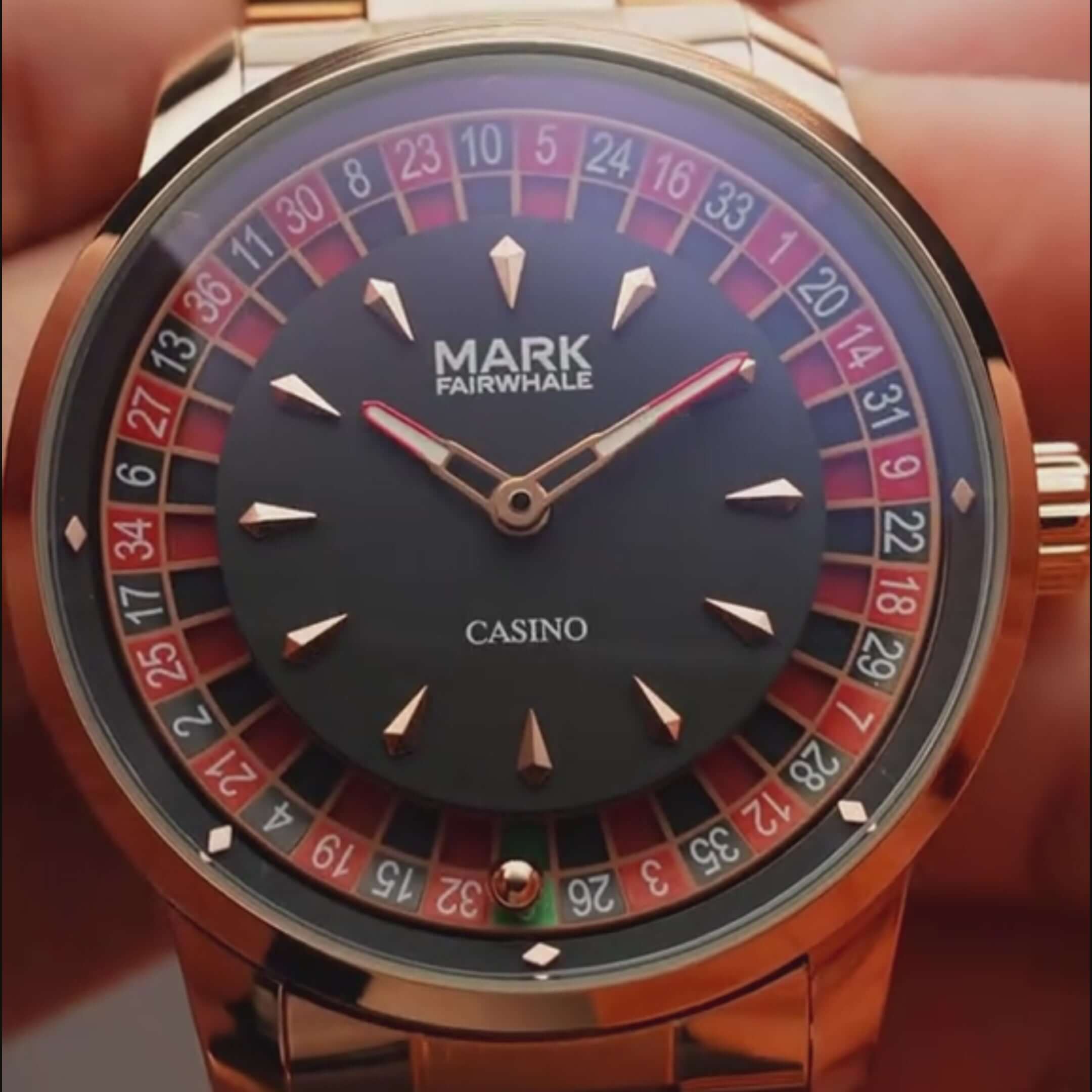 Mark Fairwhale 5031 ROULETTE Imperial Roulette – Gold-tone rotating dial watch for men with diamond accents and Arabic numerals