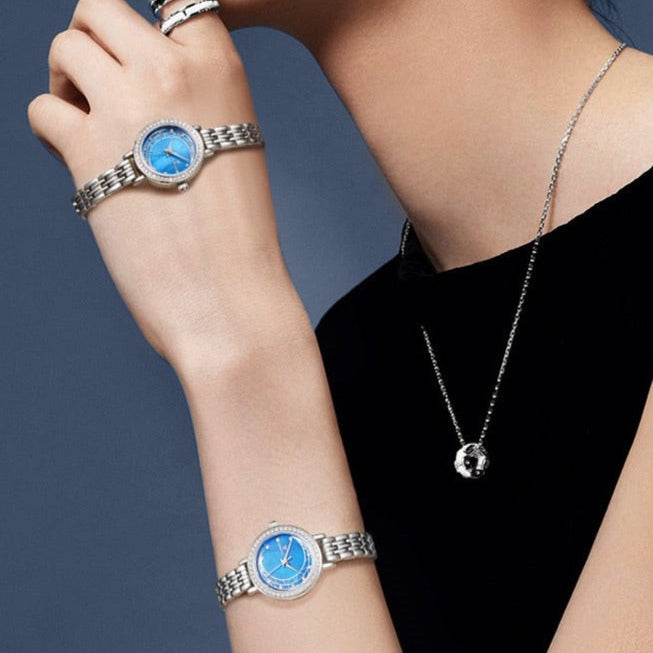 Close-up of Mark Fairwhale FW-3400 LUNAR blue dial with star markers and crystal ring