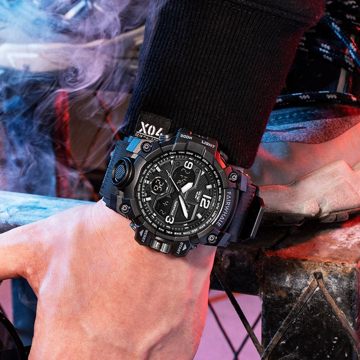 FW-4230 ROGUEFORCE black tactical watch worn on wrist in an urban setting with smoke.